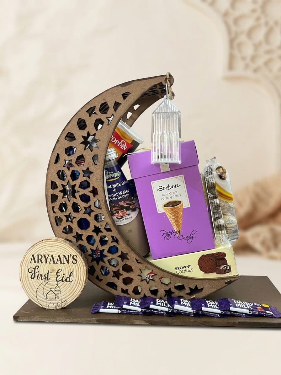 Laser-cut crescent moon gift tray with a lantern, a gift box and a personalised “First Eid” wooden disc